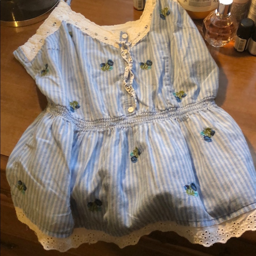 Light blue baby doll tank.